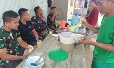 Disela Istirahat, Personel Satgas TMMD Disuguhi Bubur Kacang Hijau oleh Warga 