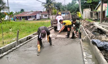 Satgas TMMD Laksanakan Semenisasi di Jalan Hiu 2 Gang Saiyo