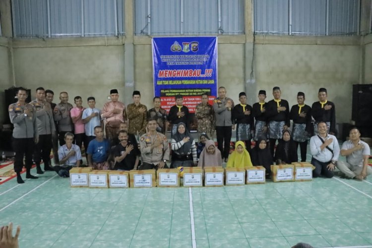 Kapolres Kampar Patroli Jelajah Sungai, Salurkan Bansos dan Himbau Masyarakat di Desa Terpencil