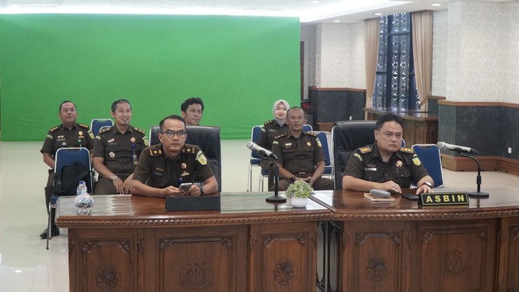 Plh. Asbin Kejati Riau Mengikuti Penyampaian Hasil Survey Persepsi Anti Korupsi (SPAK), Survey Persepsi Kualitas Pelayanan (SPKP) & Survey Kepuasan Masyarakat (SKM) secara virtual