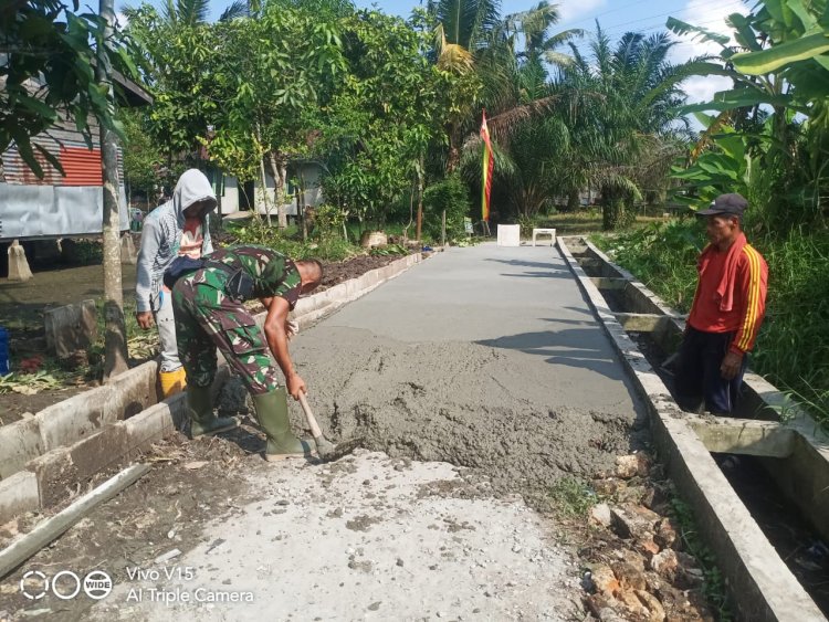 Satgas TMMD dan Warga Gotong royong Selesaikan Sasaran Fisik Semenisasi