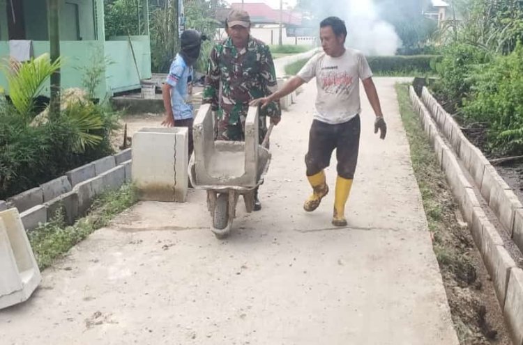 Satgas TMMD Pasang U-Ditch Drainase di Ruas 12 Guna Kurangi Genangan Air