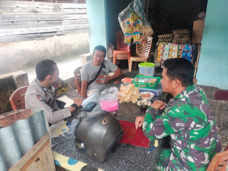 Babinsa kodim 0301/PbrAjak Masyarakat Terus Jaga Keamanan Lingkungan