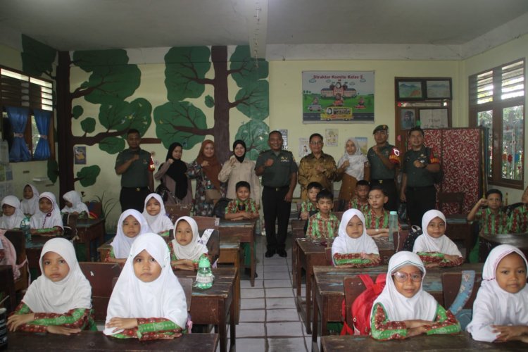 Dukung Kesehatan Anak, Kodim 0301/Pbr Bagikan Makanan Bergizi di SDN 82