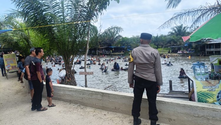 Polsek Kampar Kiri Hilir Amankan Pemandian H. Ujil, Berikan Himbauan Kamtibmas kepada Pengunjung