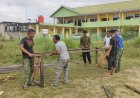 Personel Kodim 0301/Pekanbaru Bersama Warga Laksanakan Pembuatan Boplang Jembatan
