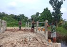 Kodim 0301/Pekanbaru dan Warga Bahu-Membahu Sukseskan Pembangunan Jembatan Garuda