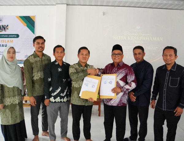 KPU Provinsi Riau dan Universitas Islam Al-Kifayah Riau Perkuat Sinergi melalui Penandatanganan MoU